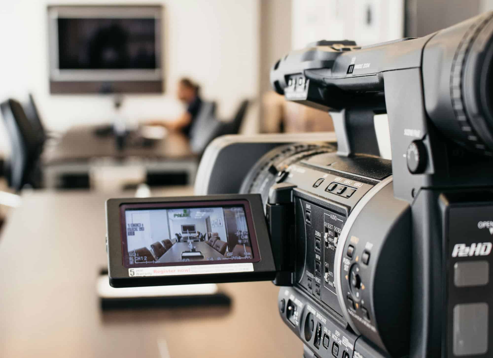 Corporate video production team filming a business video in Singapore