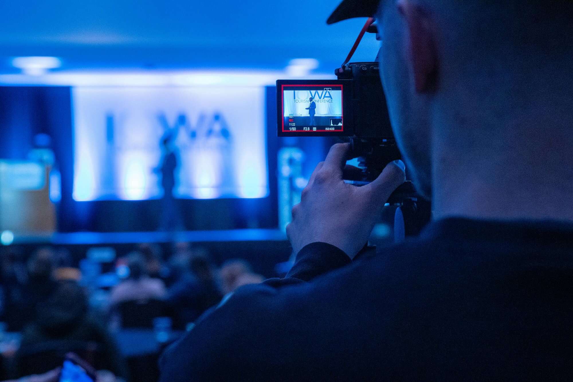 Event video production crew filming a corporate event in Singapore