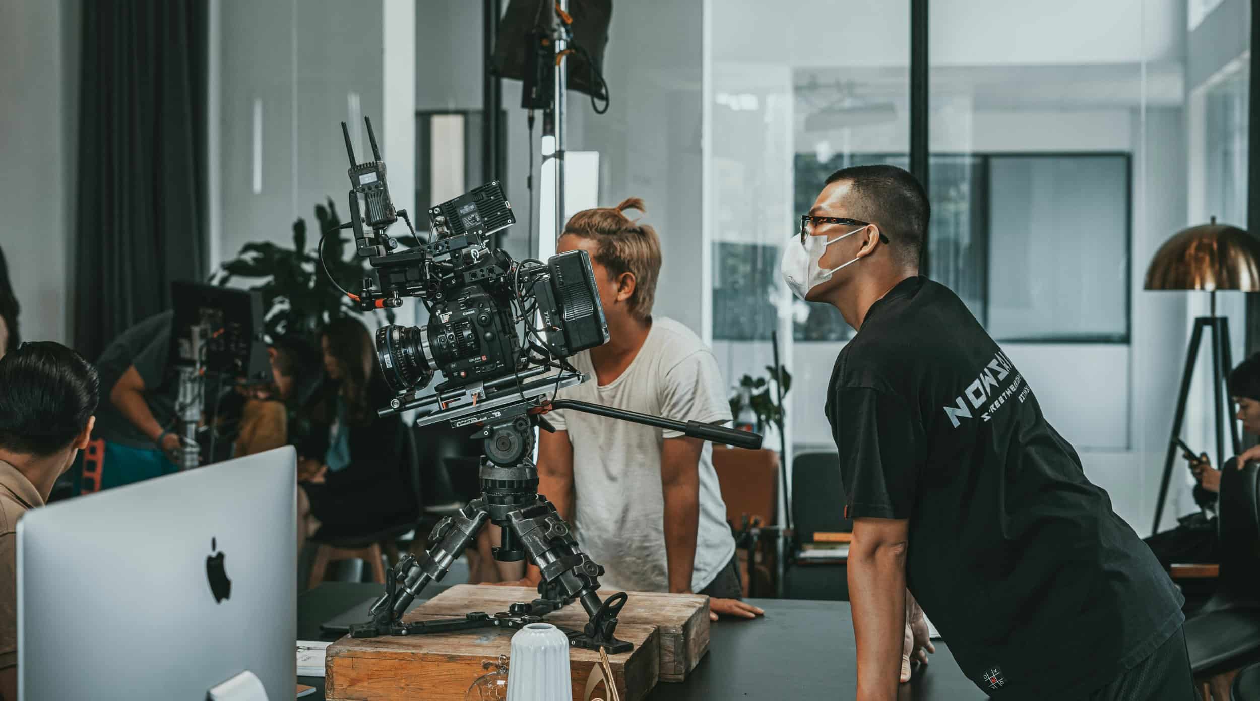 Video production company team planning a corporate shoot in Singapore