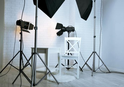 Photo studio with modern interior and lighting equipment