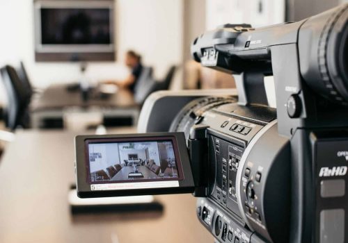 Corporate video production team filming a business video in Singapore